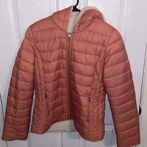 Reversible puffer jacket.